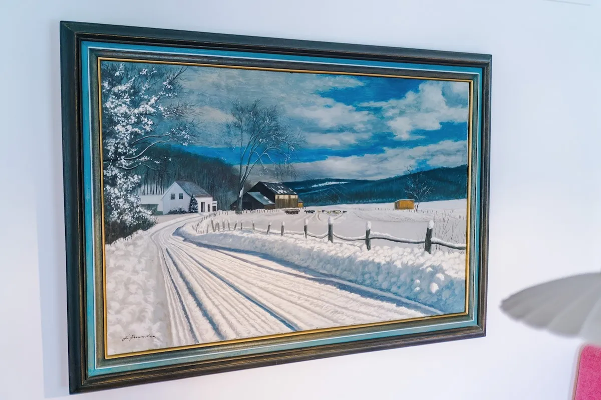 Snow scene painting on the lounge wall