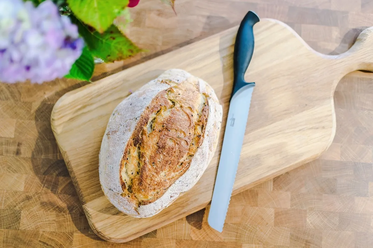 Bread board and knife on the island