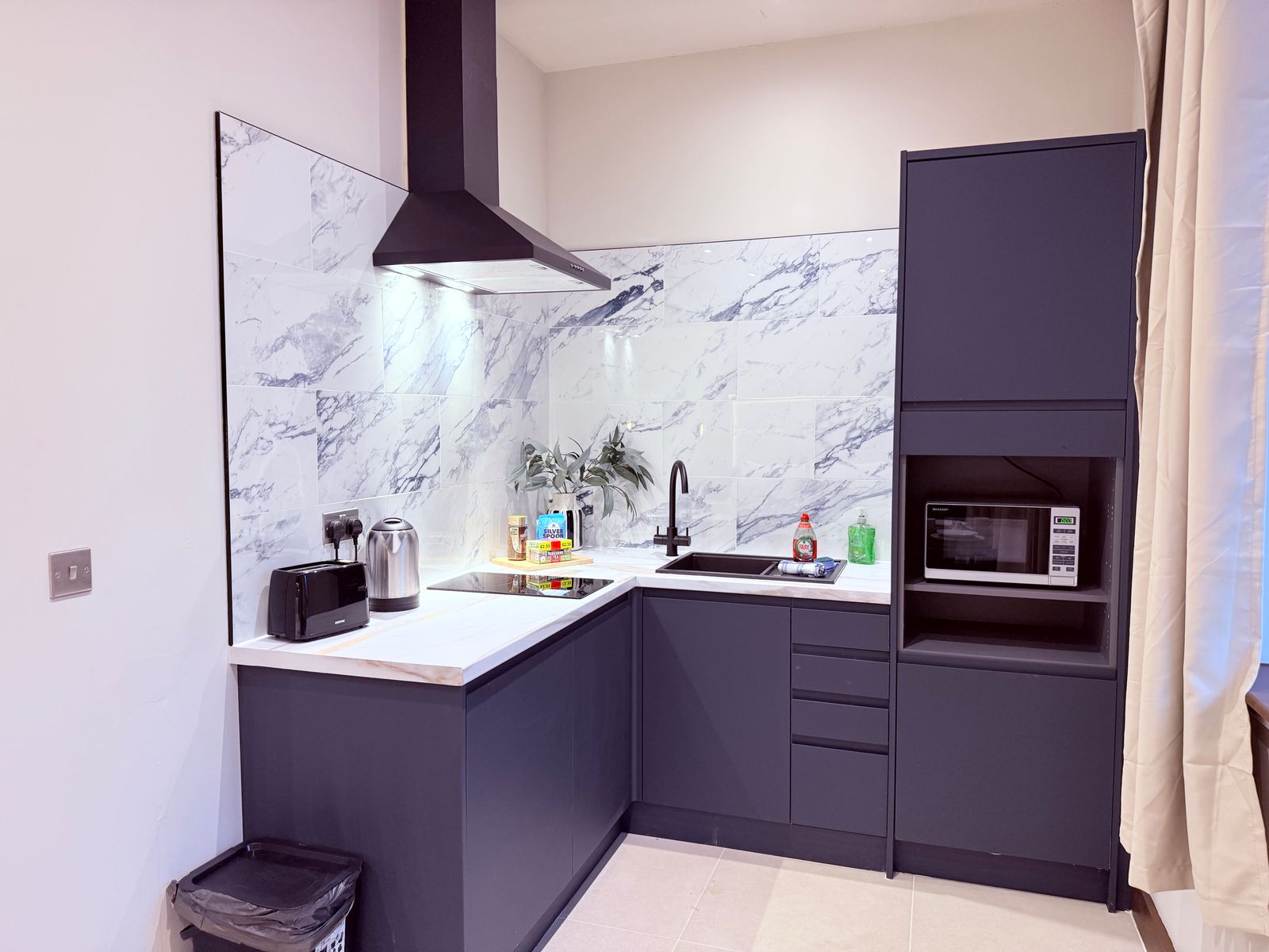 Afan Valley Aparthotel | Kitchen & Parking | No.5