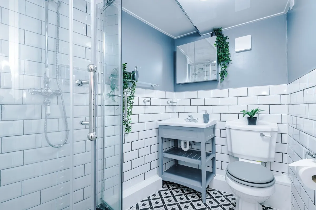 Shower room with a glass enclosure and vanity unit
