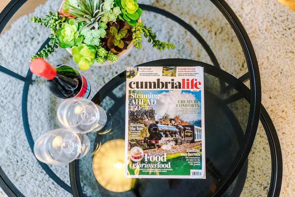 Cumbria Life magazine on the glass coffee table