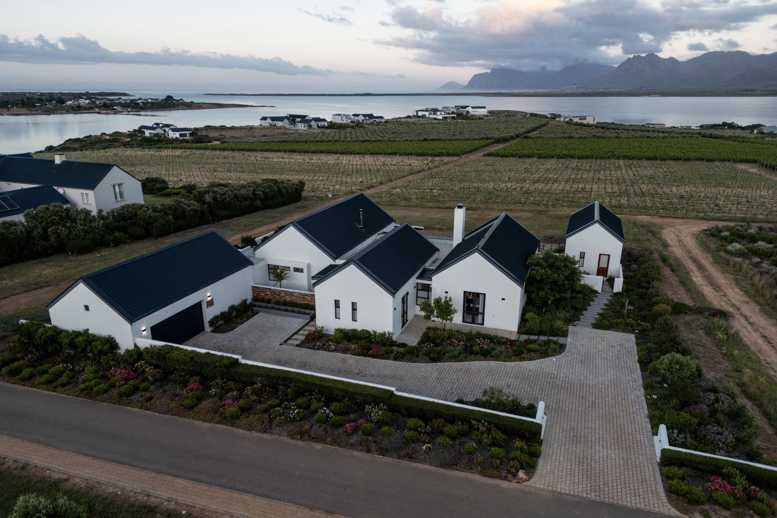 Your private paradise: Pool, hot tub, vineyard & lagoon views at Utopia