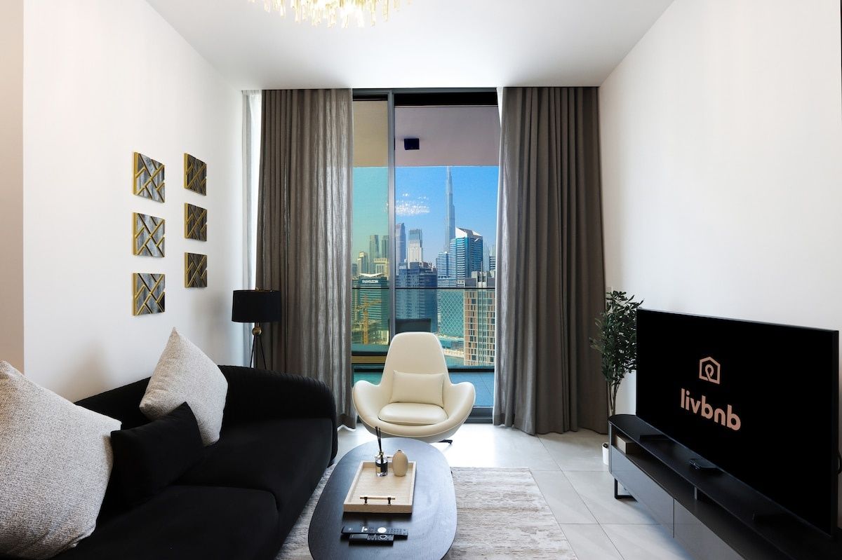 1BR Paragon Tower | Burj Khalifa & Canal Views