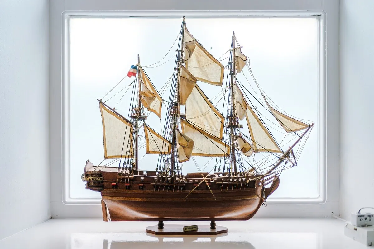 Model tall ship on a window sill