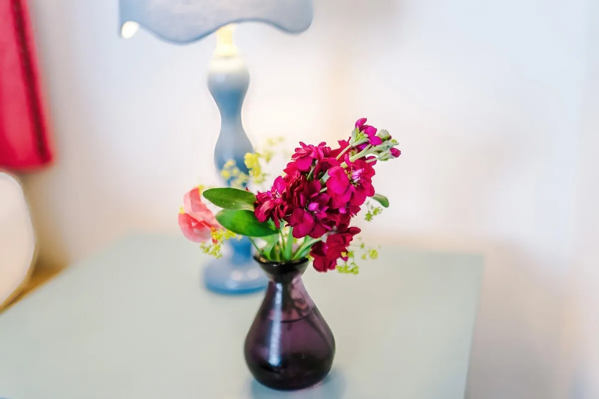 Flowers on the bedside table