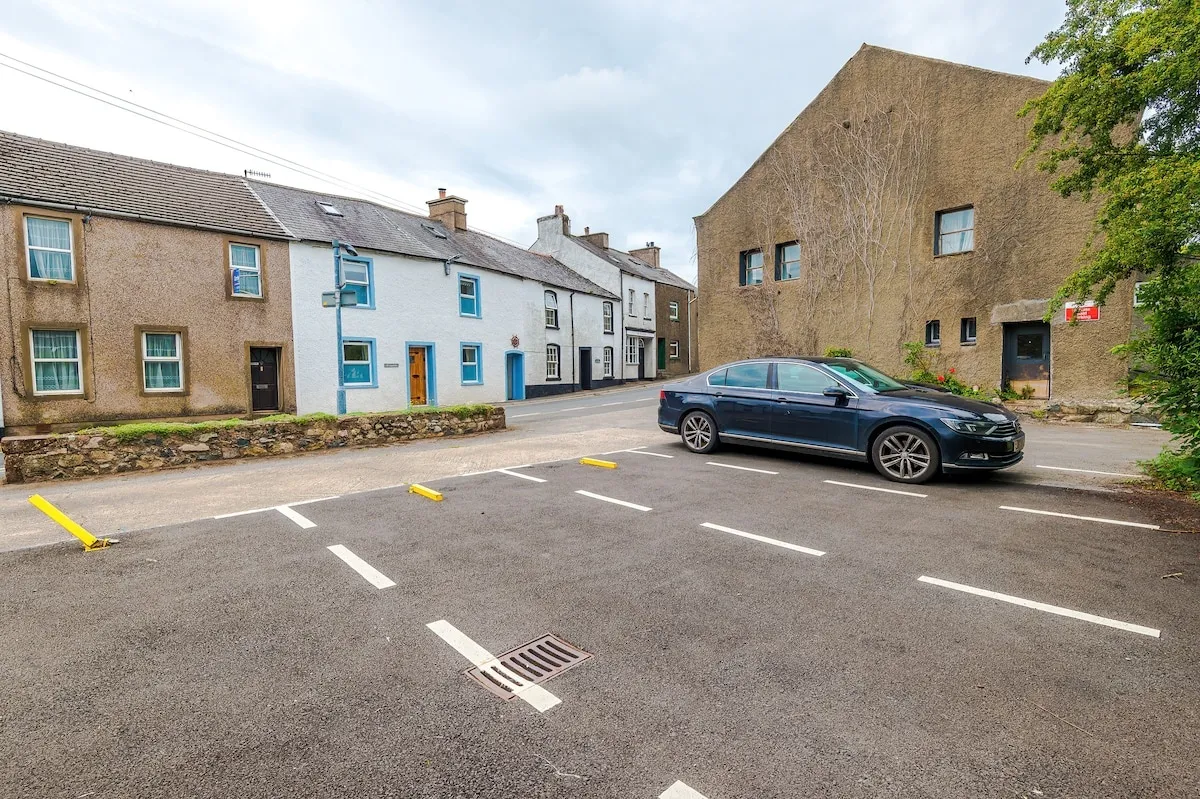 Parking along the street by the house