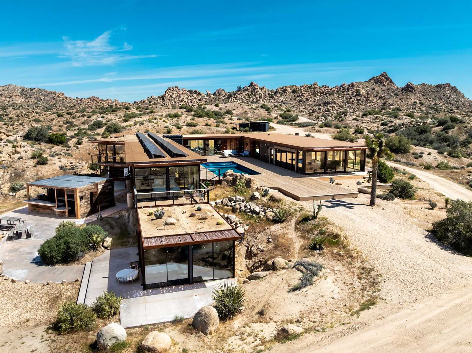 Iconic 7,000sf Glass Villa w/ 2 Pools on 350 Acres