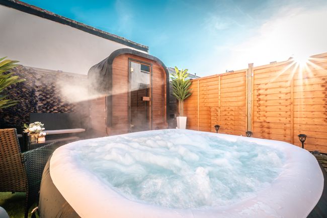 Hot Tub & Sauna Retreat | 4BR w/ Free Parking