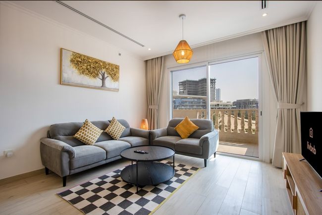 Bright 2BR in JVC | Pool, Gym & Modern Comfort