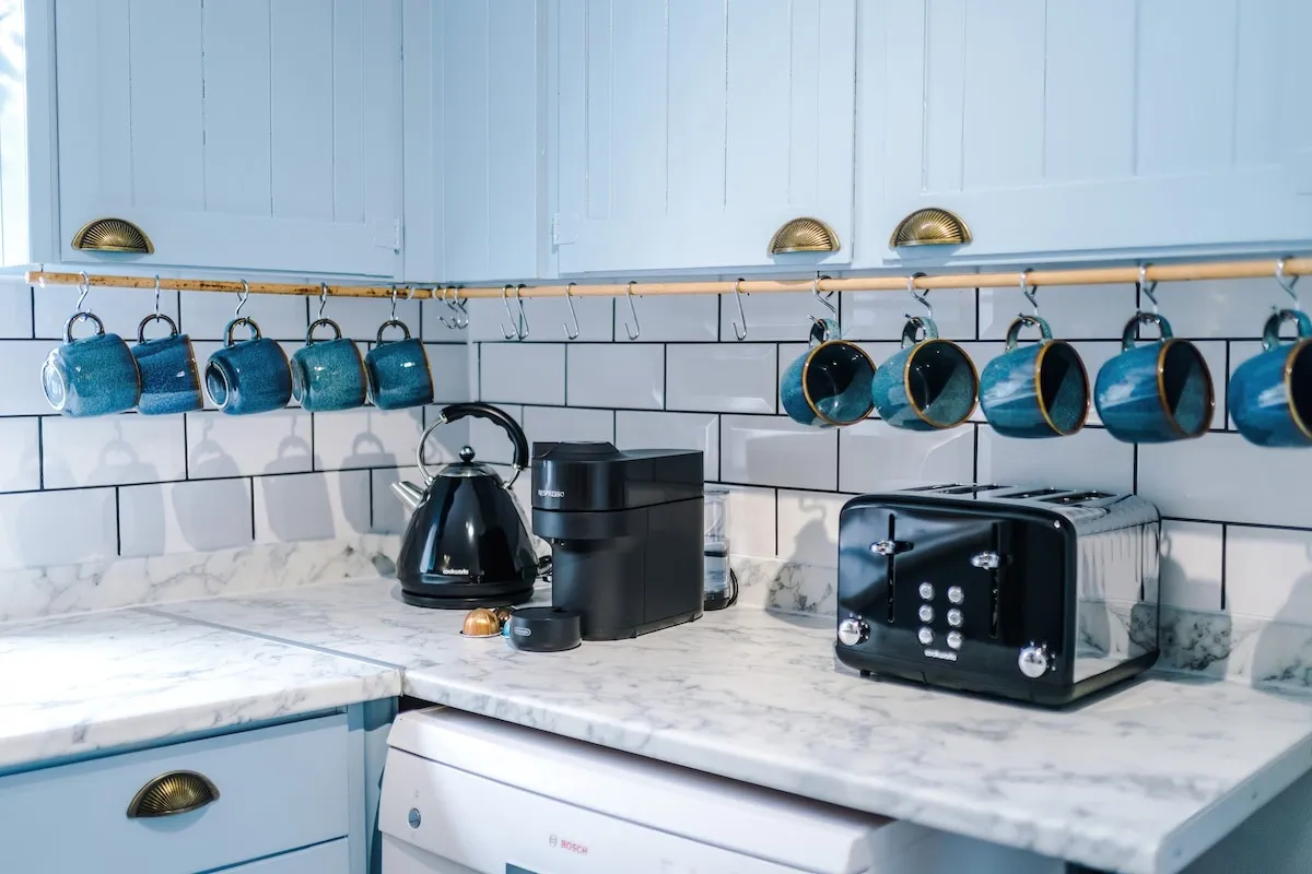 Mugs hanging above the worktop