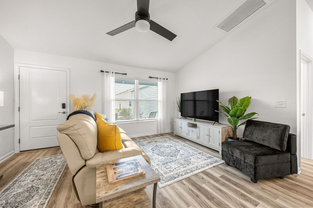 Villages Escape by Eastport Square — a 3-bedroom rental with a golf cart and BBQ