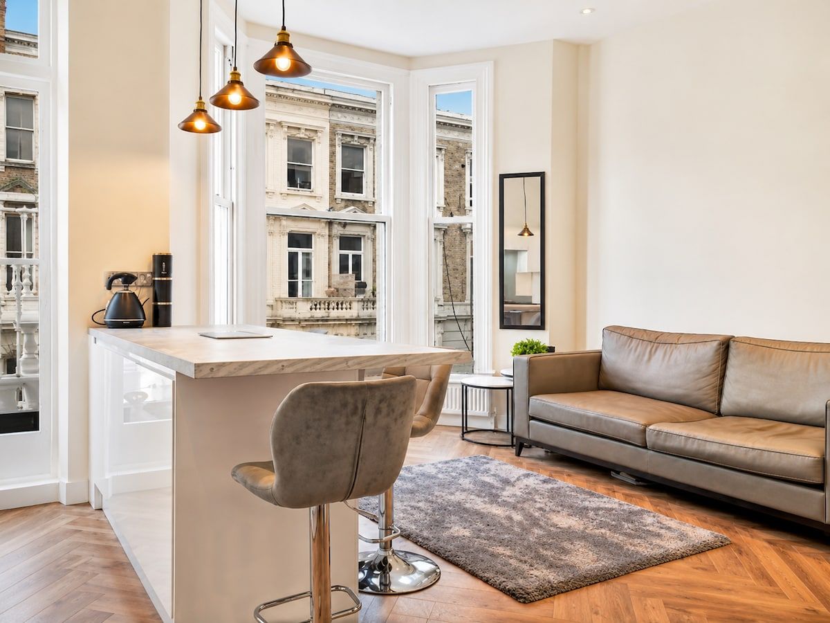 Bright West Kensington Flat with Private Balcony