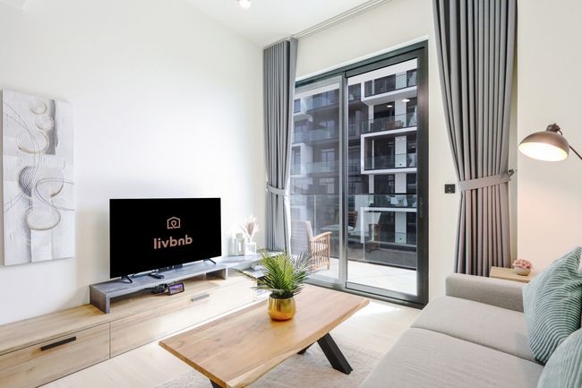 Chic 1BR in JVC with Balcony | Near Mall & Parks