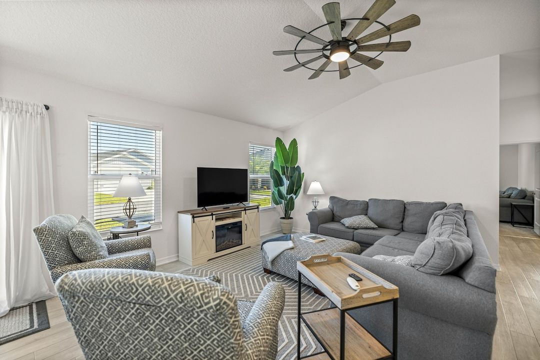 The Eastport Escape — a newly built 3-bedroom rental with a king bed and golf cart