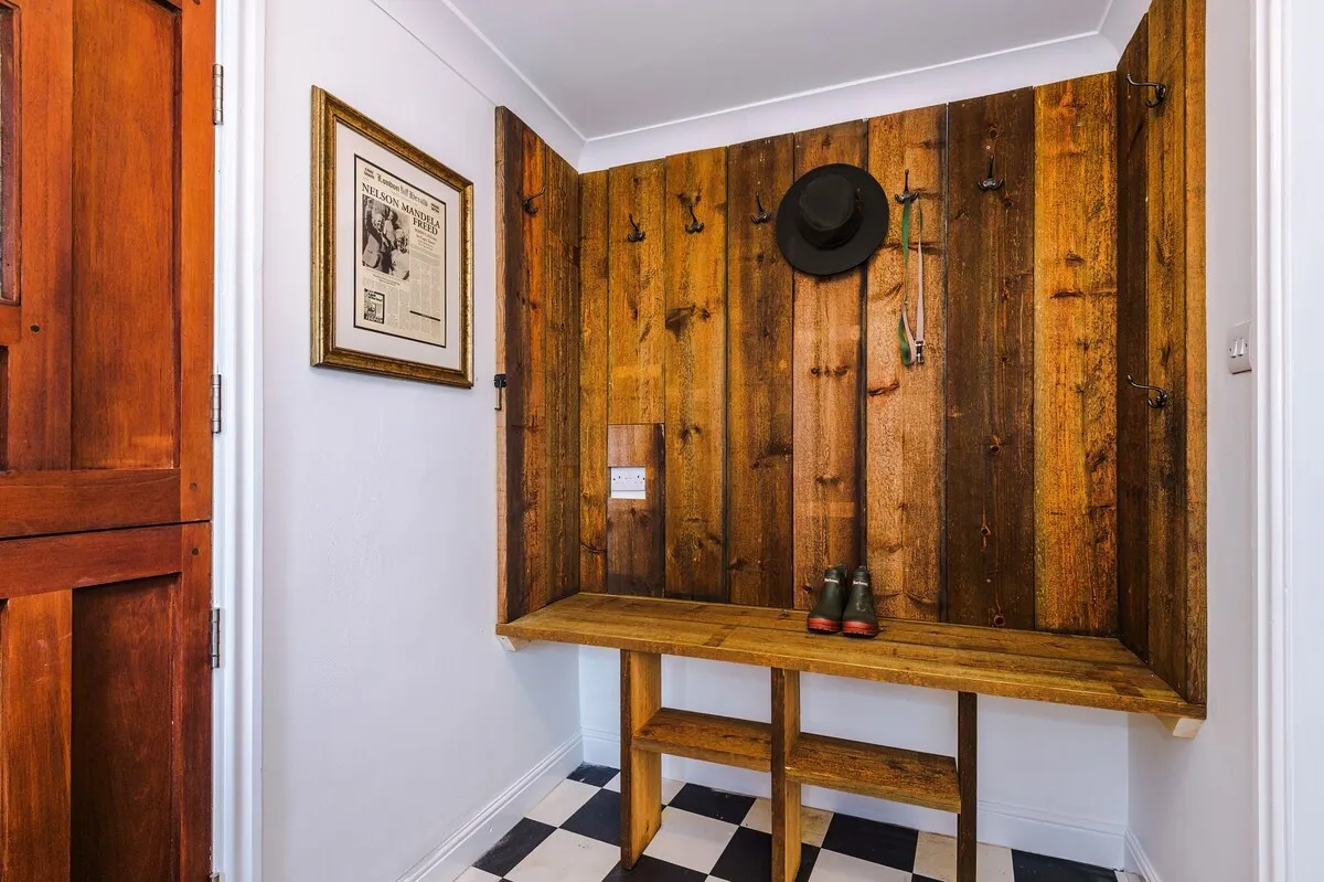 Entrance hall with a reclaimed-wood boot bench