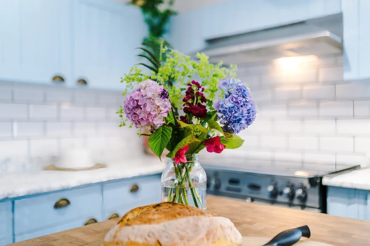 Flowers on the kitchen worktop