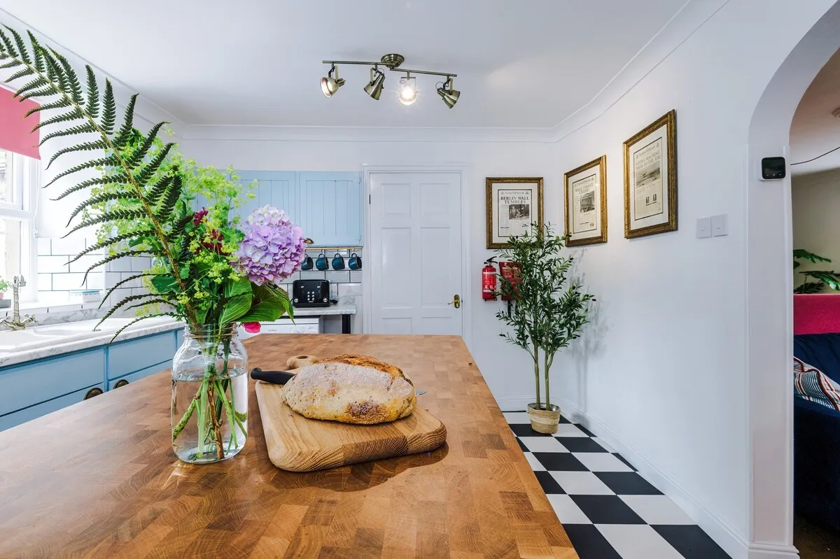 Fresh bread and flowers on the kitchen island